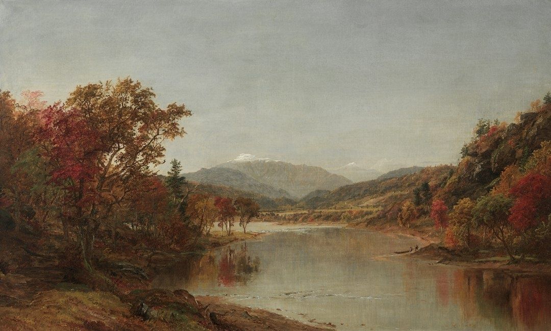 19th-century-style landscape with a calm lake, autumn trees, and mountains